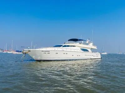 Allegra, a Ferretti 88 luxury motor yacht, underway off Mumbai with her name visible on the bow